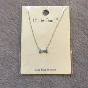 Silver dog bone charm necklace